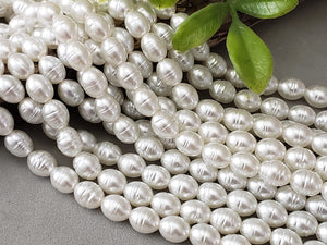 Fresh Water Potato Glass Pearls - 8x6mm - 15.5" Strand