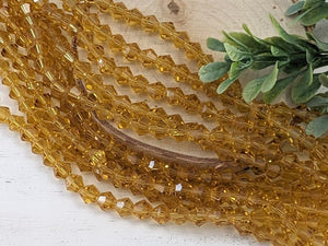 Honey - Faceted Crystal Bicone - 6mm - 9"