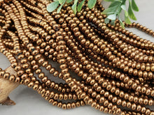 Charger l&#39;image dans la galerie, Copper Shimmer - Smooth Glass Rondelle - 4mm - 15&quot; Strand
