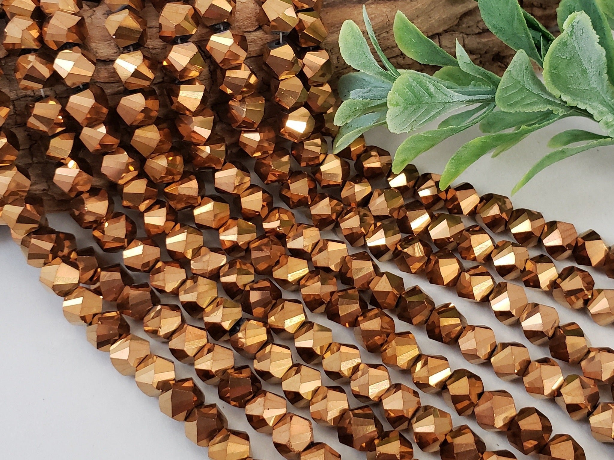 Metallic Copper - Faceted Helix Crystals - 6mm - 9.5" Strand