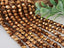 Metallic Copper - Faceted Helix Crystals - 6mm - 9.5" Strand