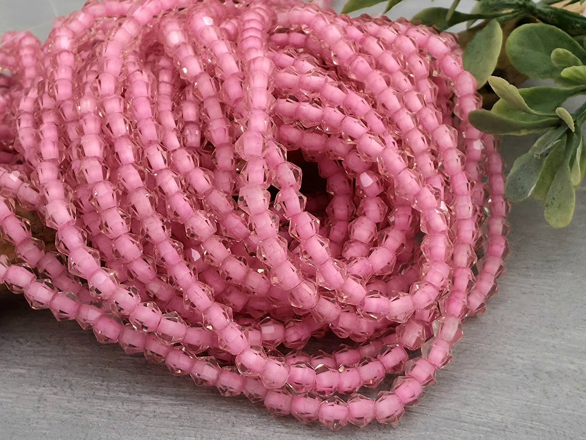 Bubble Gum Pink Lined Crystal Bicone - 4mm - 10" Strand Main image