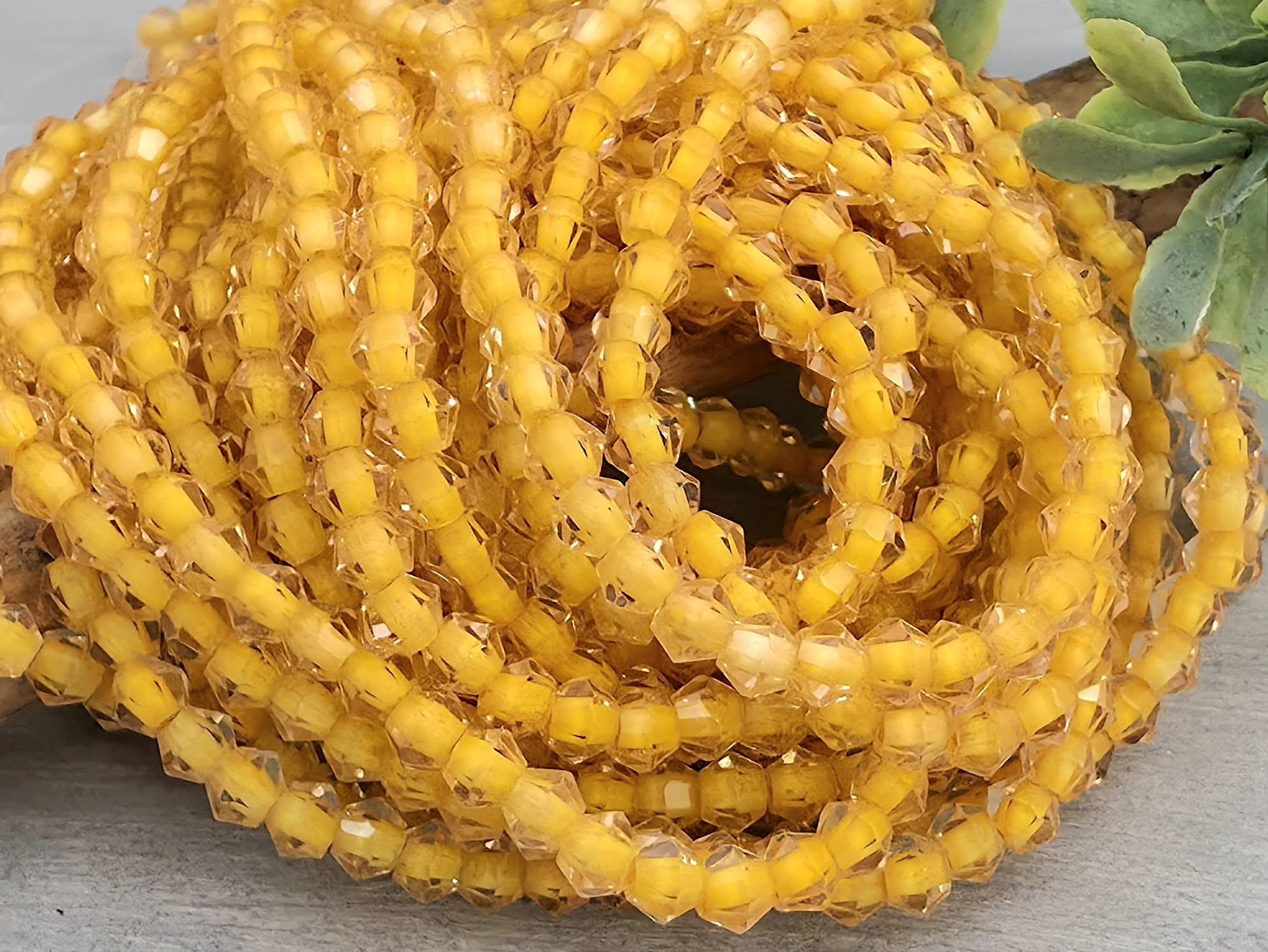 Mango Lined Crystal Bicone - 4mm - 10" Strand