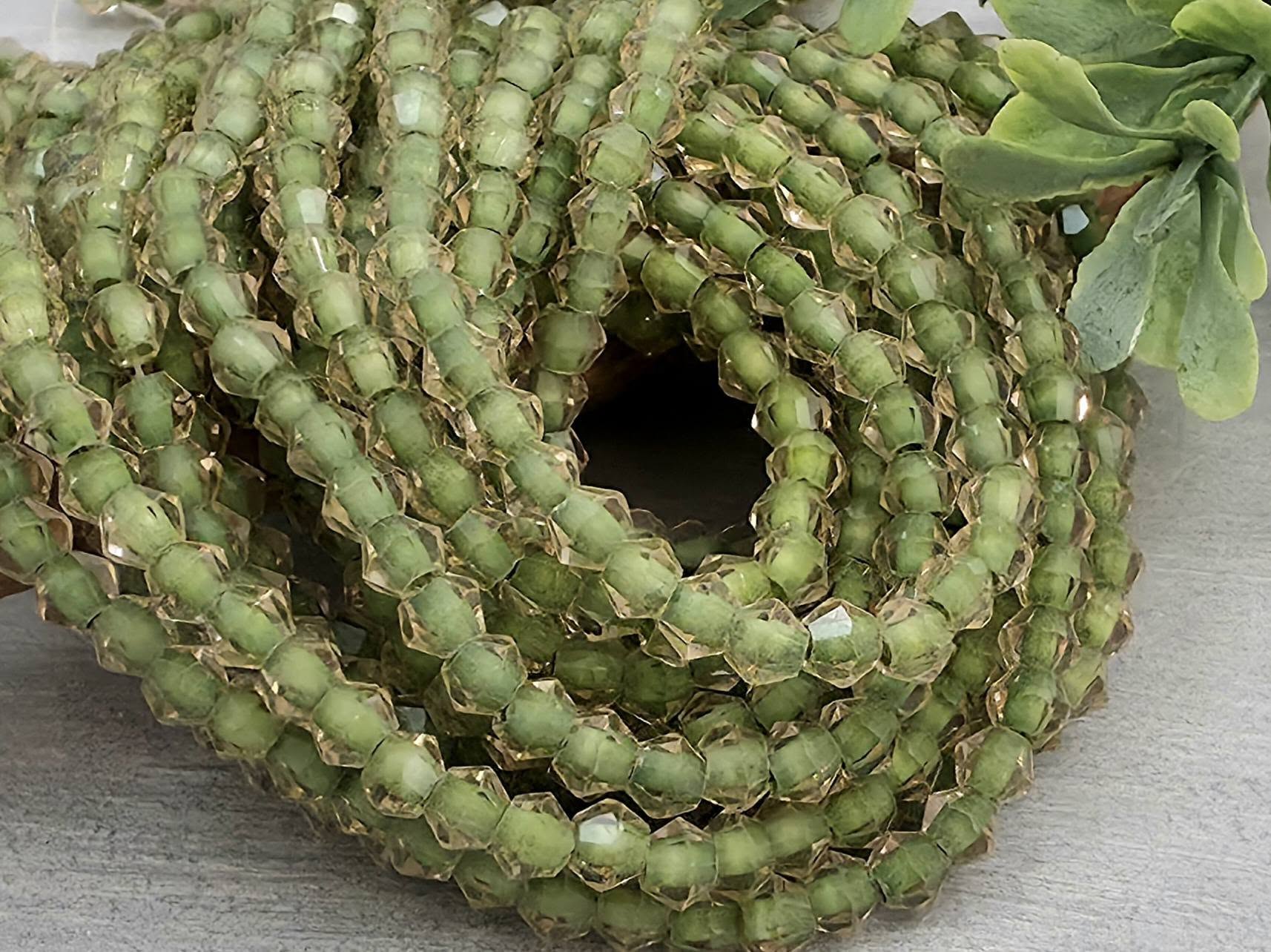Olive Lined Crystal Bicone - 4mm - 10" Strand