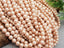 Peach Champagne - Iridescent Czech Glass Pearls - 4mm/6mm - 15" Str.