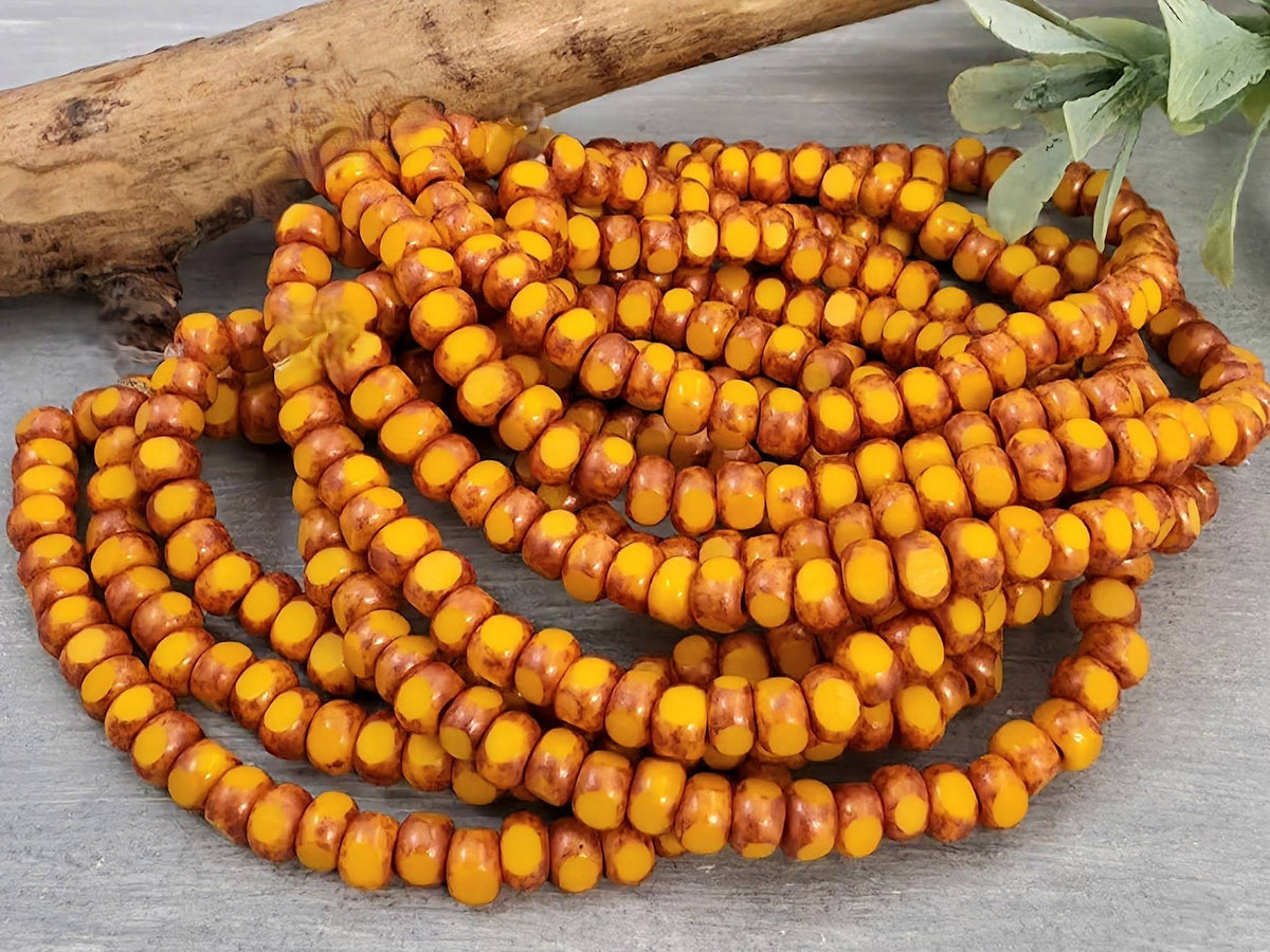 Marigold Yellow w/Ant. Copper Wash - Tri-Cut Czech Seed Beads /Rondelle - 6/0- 1 str./50pcs Main image