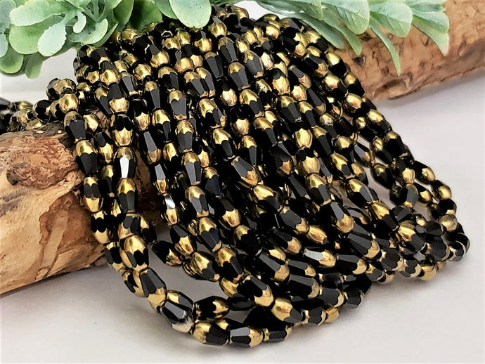 Opaque Black Bronze Faceted Teardrop Crystals - 14