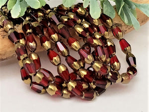 Translucent Red Bronze Faceted Teardrop Crystals - 14" Full Strand