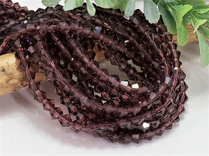 Mauve Faceted Crystal Bicone - 4mm - 14"-15" Strand
